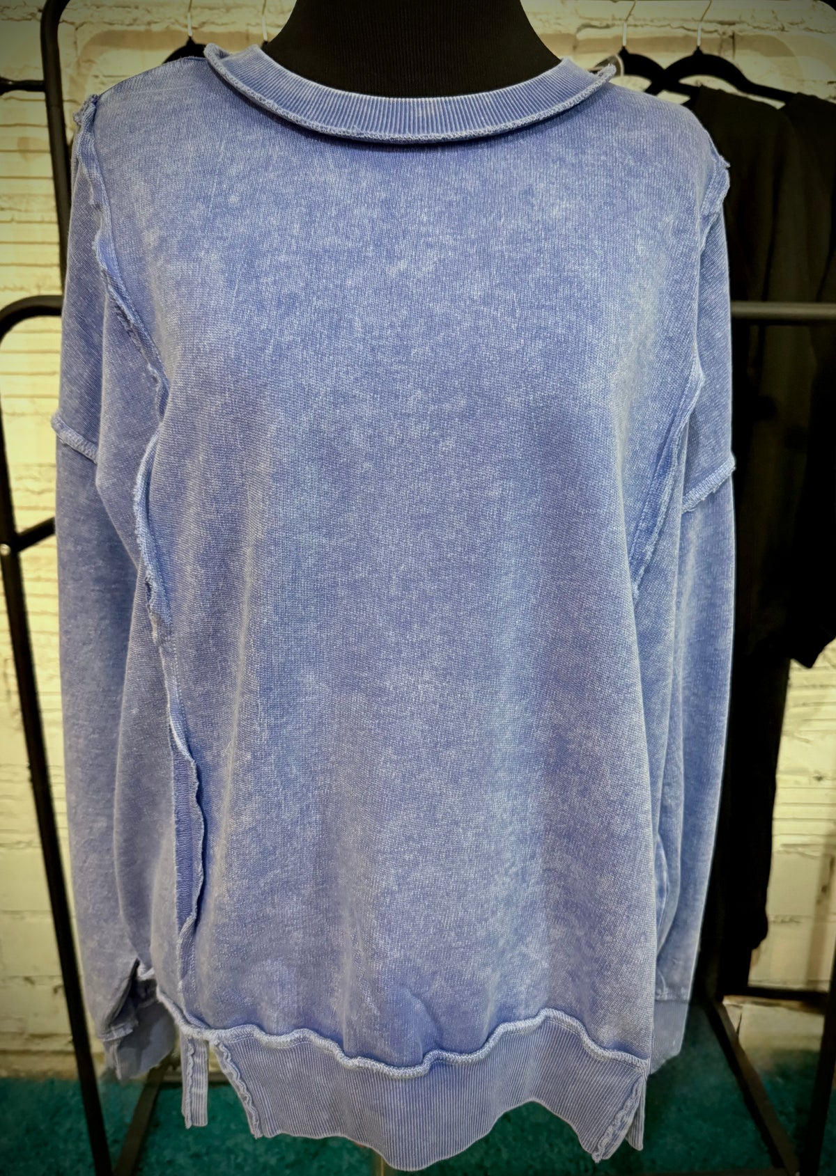 Exposed seam sweatshirt